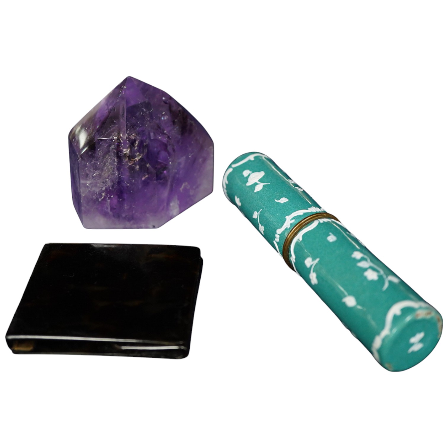 A French enamelled needle case, an amethyst paperweight and a tortoiseshell match case